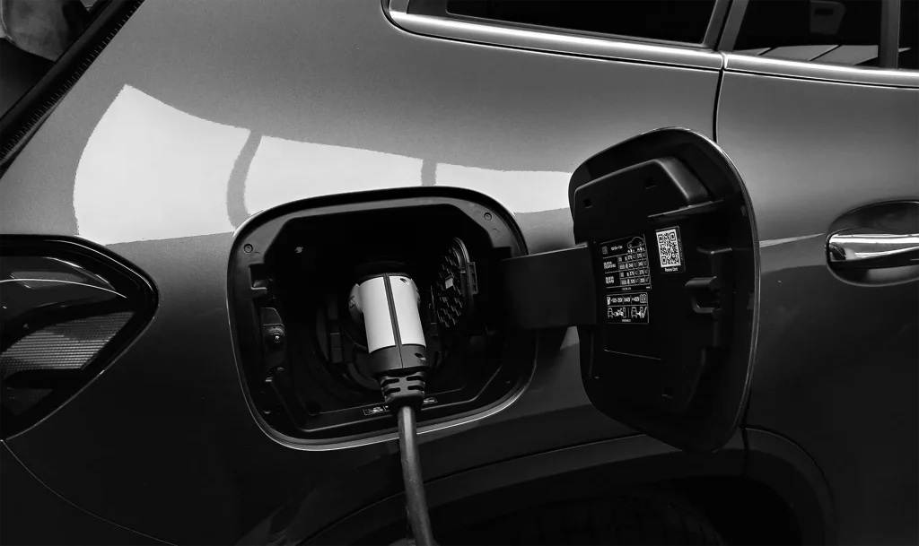 CCS connector plugged into EV to show nacs vs ccs