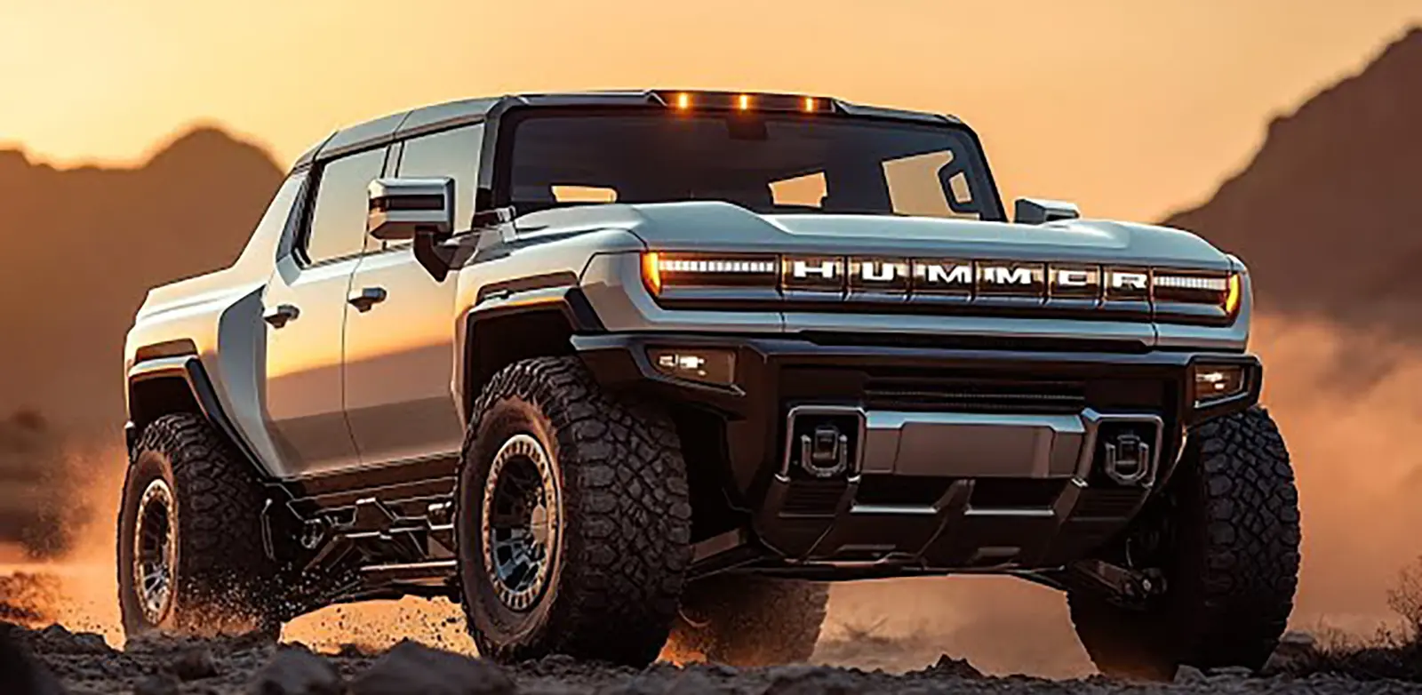Hummer EV Pickup driving off-road on a rugged terrain at sunset.