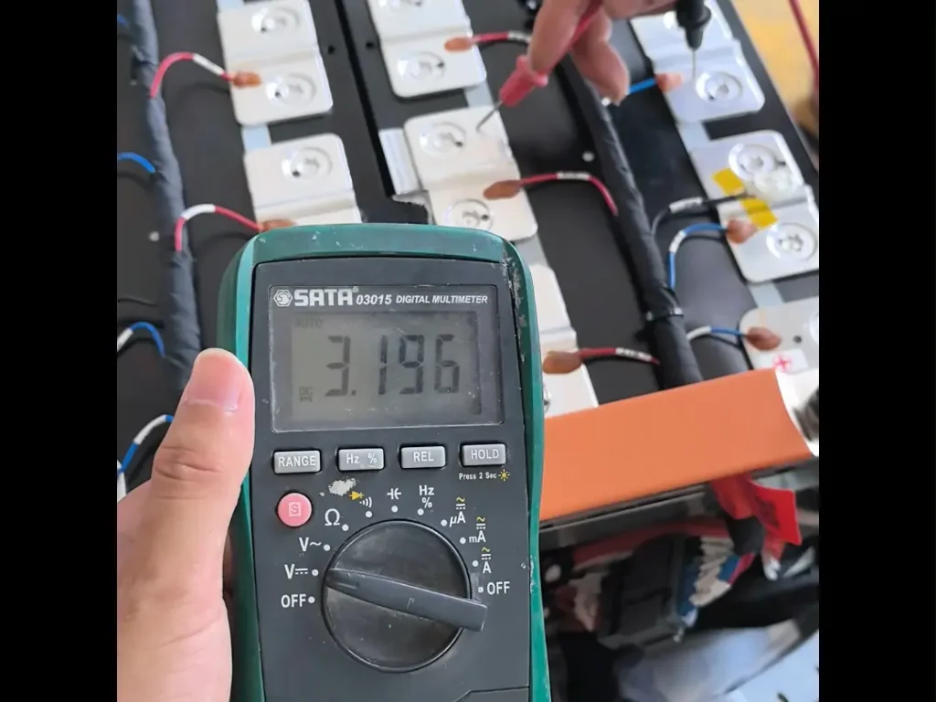 Battery SOH voltage check using a digital multimeter on individual cells