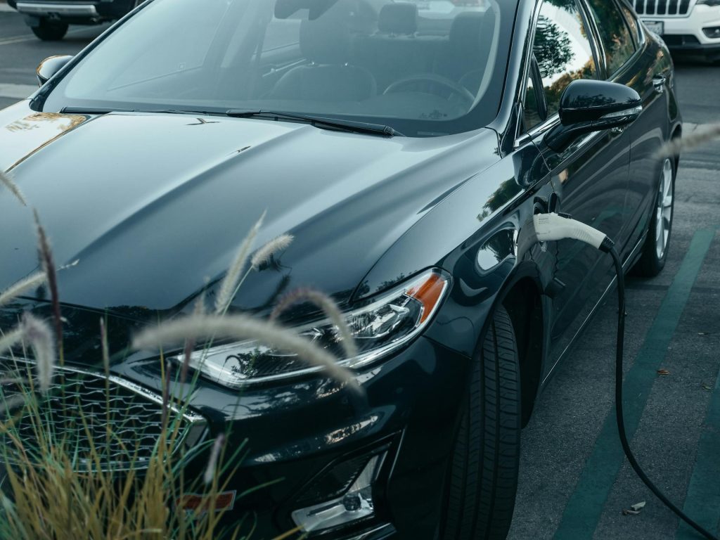 Ford EV charging at a parking spot using a portable EV charger
