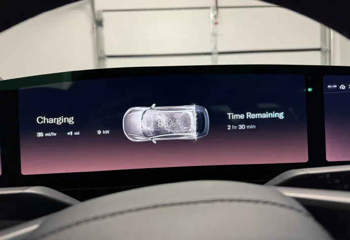 Lucid Air dashboard showing charging speed and time remaining with portable charger for tesla with a J1772 to tesla adapter