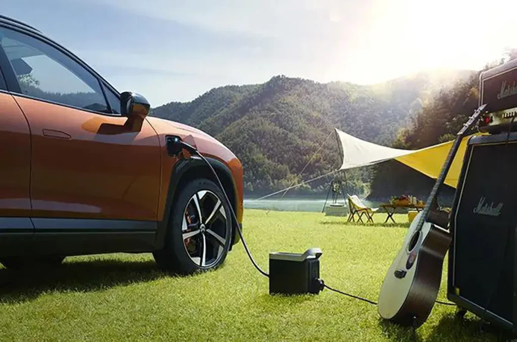 Electric vehicle using Vehicle-to-Load (V2L) feature to power outdoor music and camping equipment