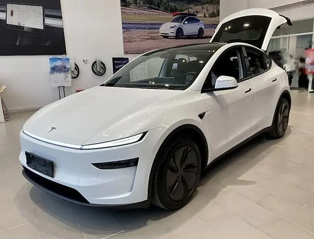 Tesla Model Y in Showroom to explain How to charge tesla Model Y