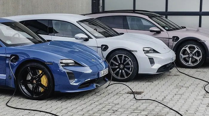 Multiple electric vehicles charging, representing the need for a Home EV Charger Readiness Assessment