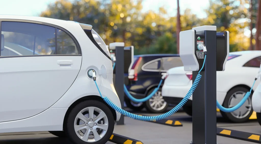 Commercial EV charging lot demonstrating dynamic load management across many chargers