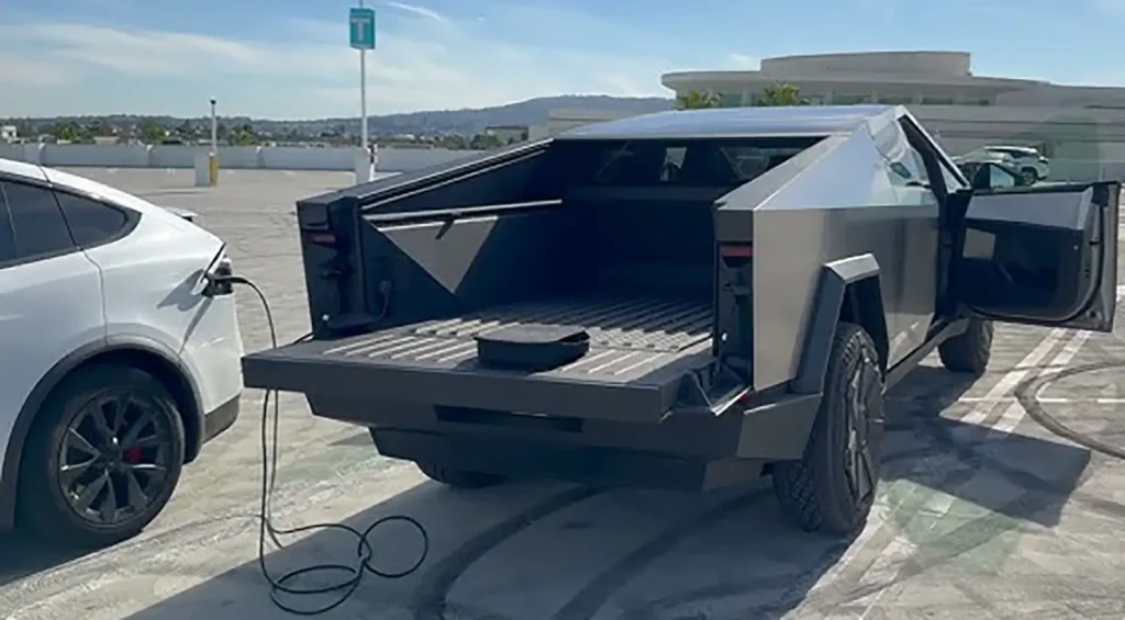 Tesla Cybertruck using Vehicle-to-Load (V2V) function to charge another electric vehicle