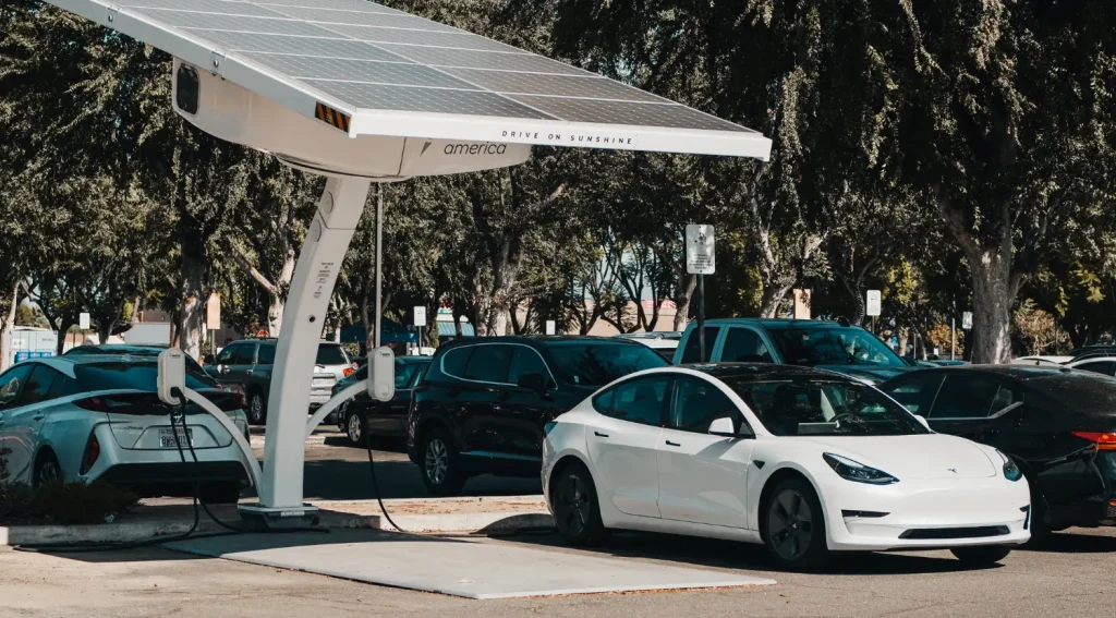 Tesla charging using the SAE J3400 connector at a solar-powered EV station