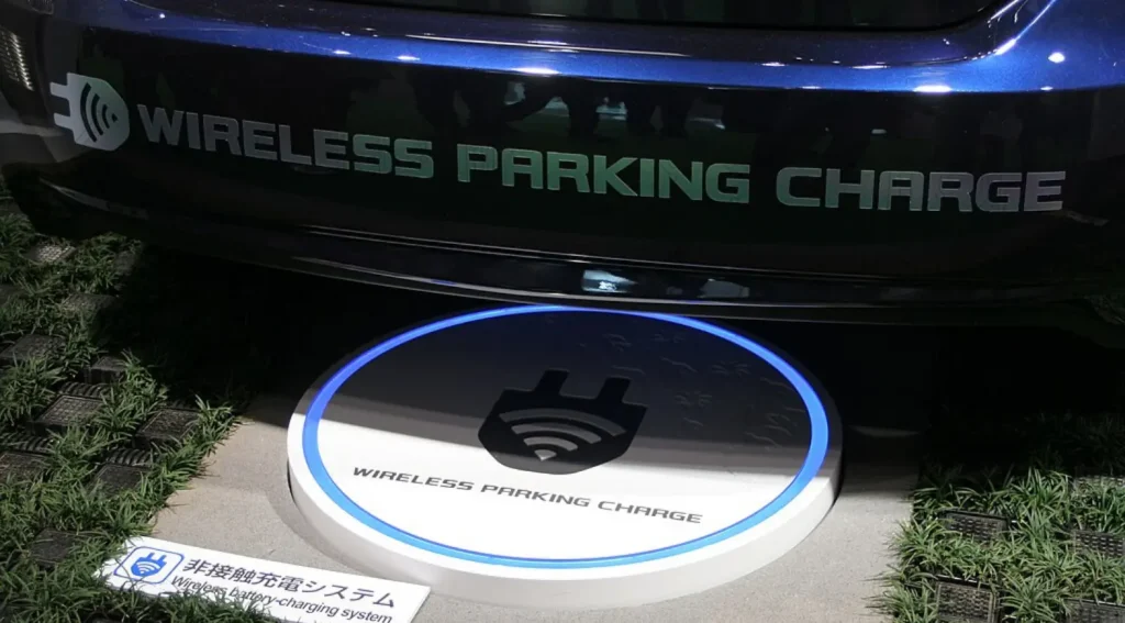 Wireless EV parking charge pad installed under a vehicle