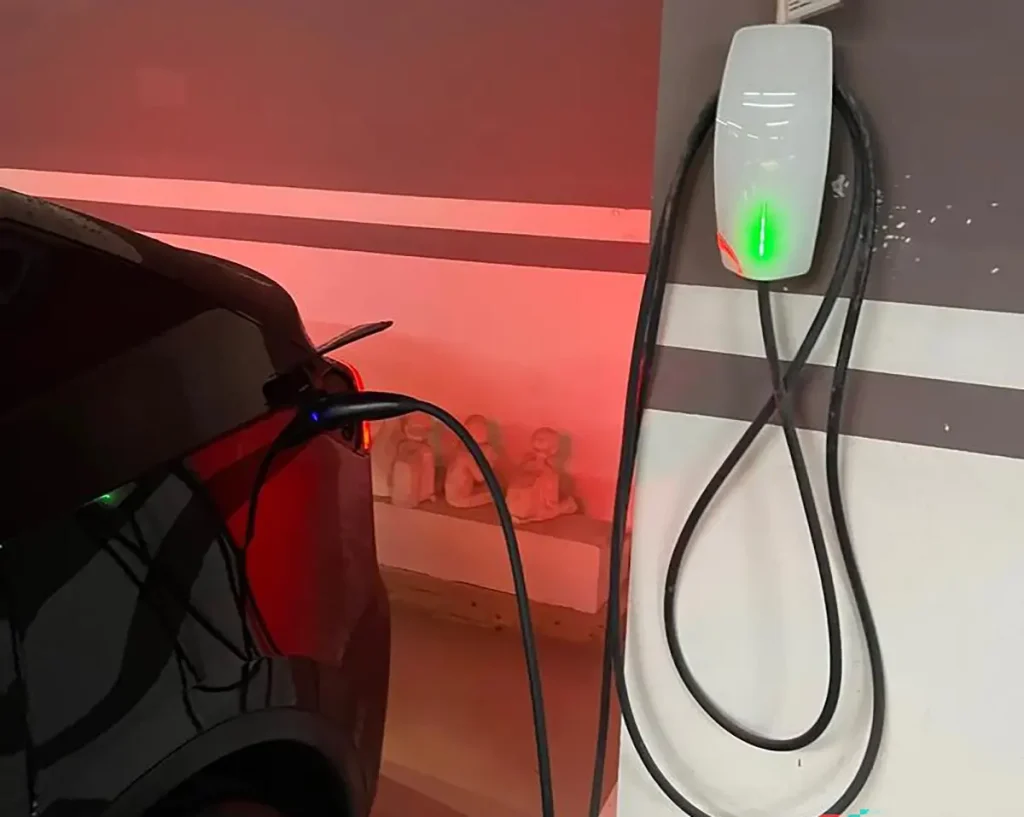 Tesla destination charger wall connector used for Level 2 charging at hotels and workplaces