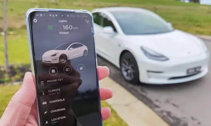 Tesla charging app interface showing vehicle status and charging options