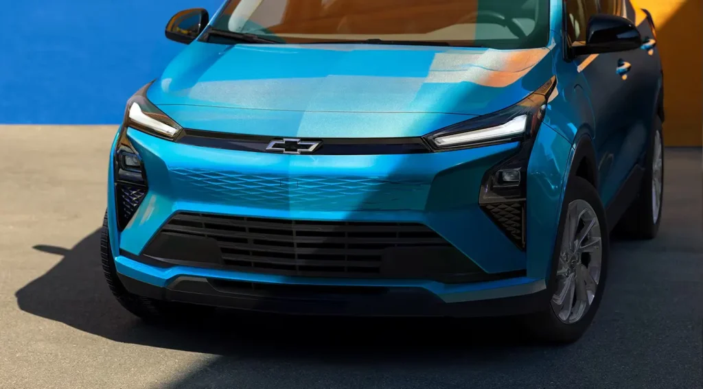 Chevrolet Bolt 2026 affordable electric car parked outside home