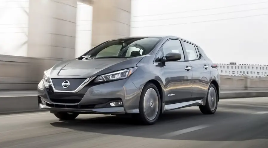 Nissan Leaf S+ electric hatchback driving on city road