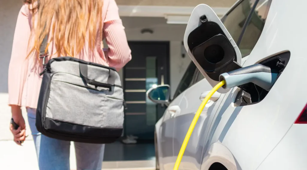 home EV charging daily routine plugging electric car at home charger