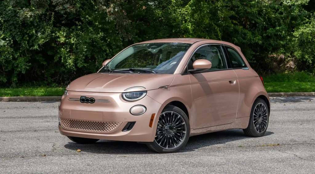 Fiat 500e compact electric car parked in urban area