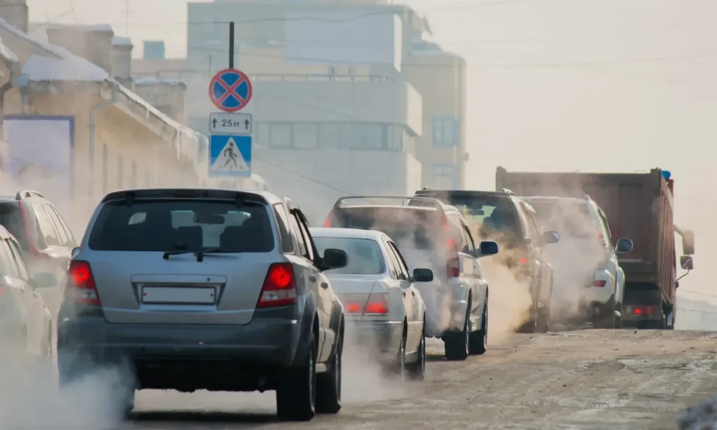 Gasoline vehicles producing tailpipe emissions that contribute to greenhouse gases and air pollution.