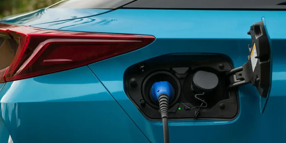 do hybrid cars need to be charged plug-in hybrid charging port close up