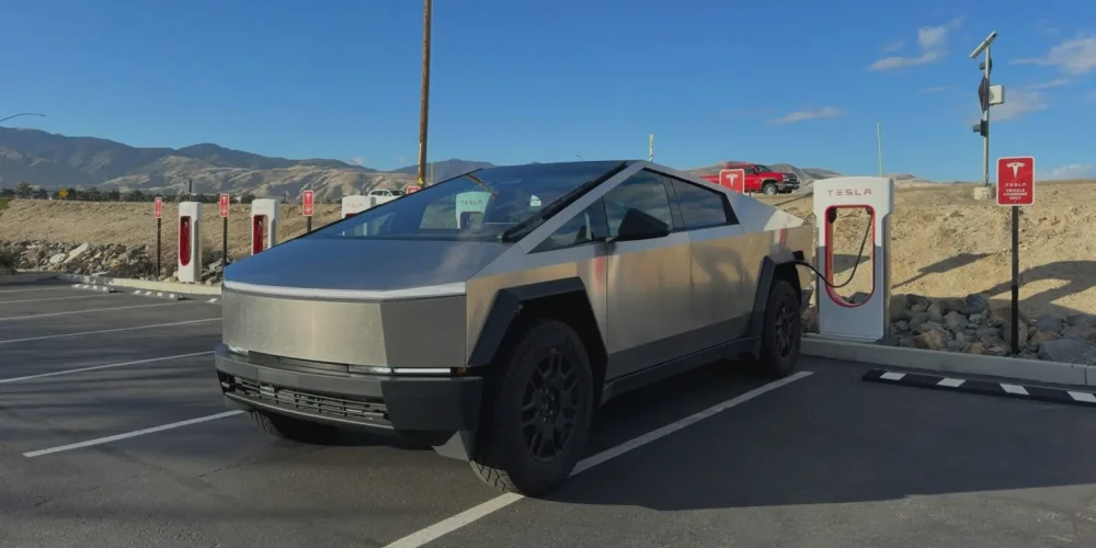 1. How to Charge Cybertruck – Complete Charging Guide Tesla Cybertruck charging at a Supercharger station – how to charge Cybertruck guide
