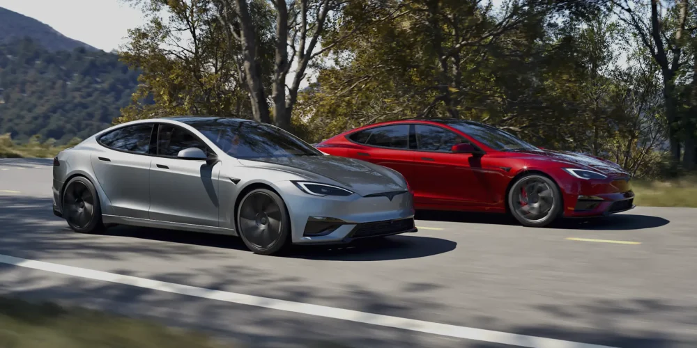 1. how to charge a tesla model s Tesla Model S driving on a scenic road –demostrating how to charge a tesla model S